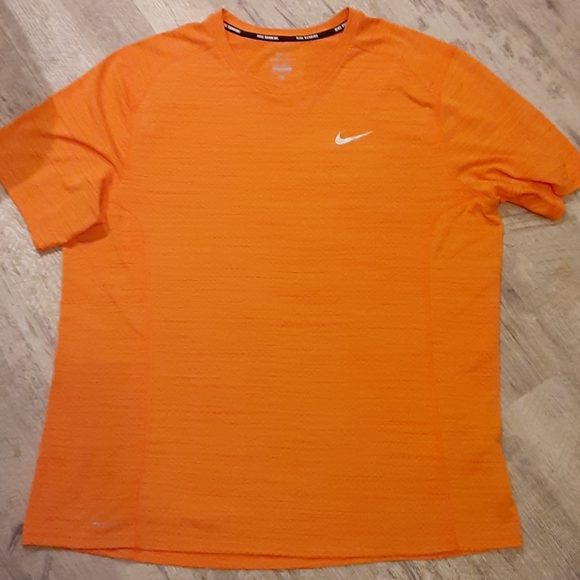Loose fit Nike orange dri fit top